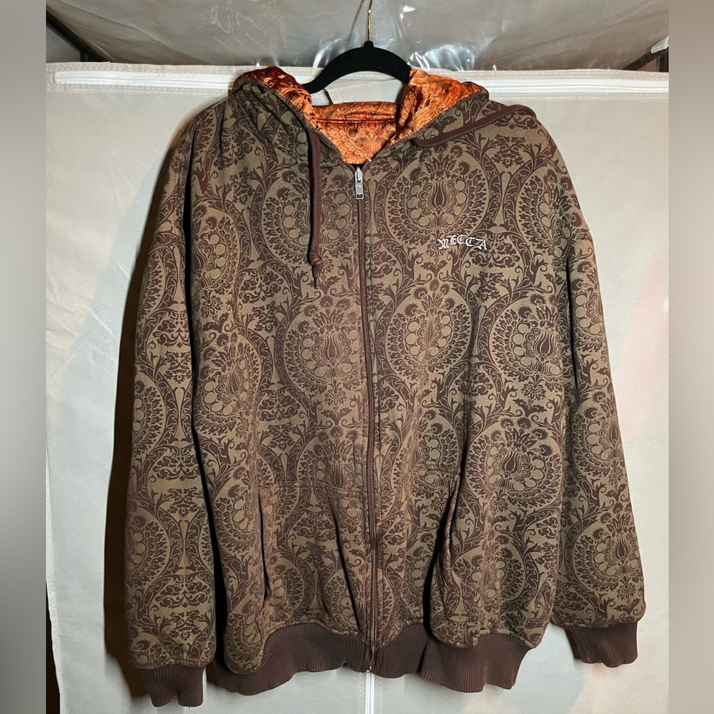 Mecca reversible jacket. Zipper is messed up but works with a little effort.